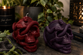 Red and dark purple skull candles
